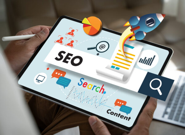 businessman Search engine optimization, SEO Marketing on a tablet screen